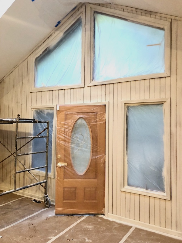 lake house remodel front door during reno