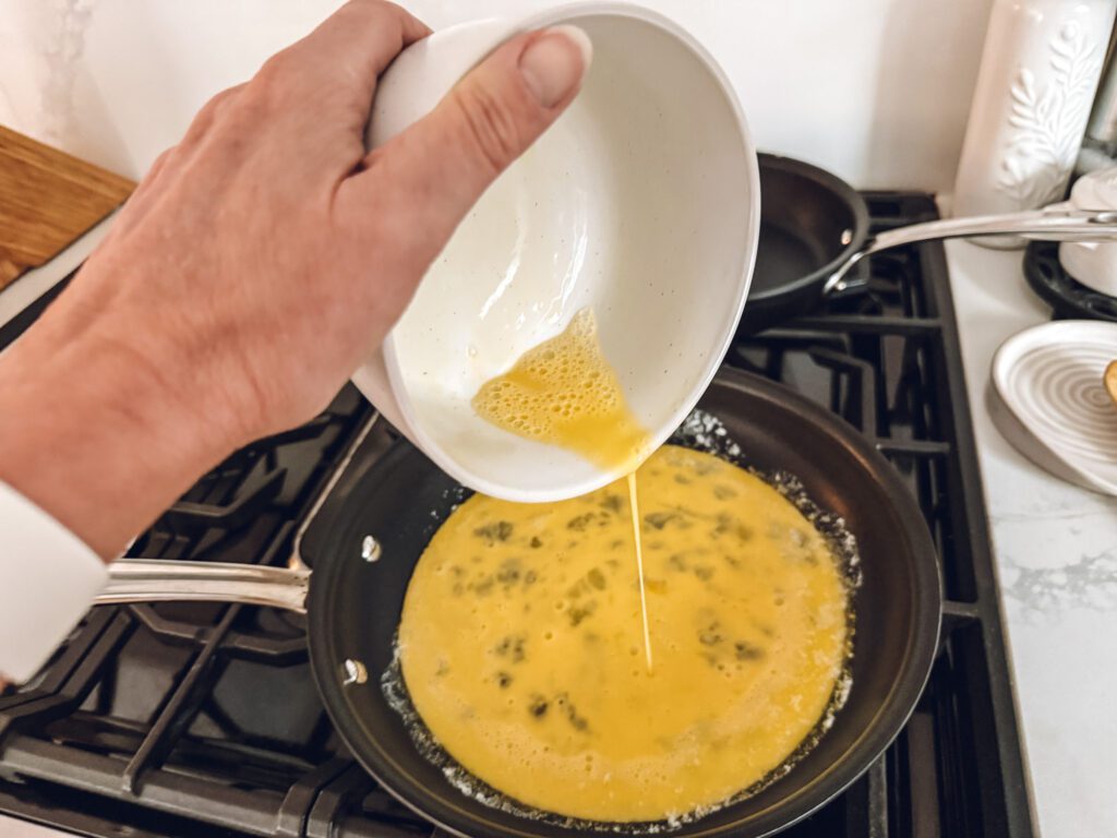 eggs poured into skillet