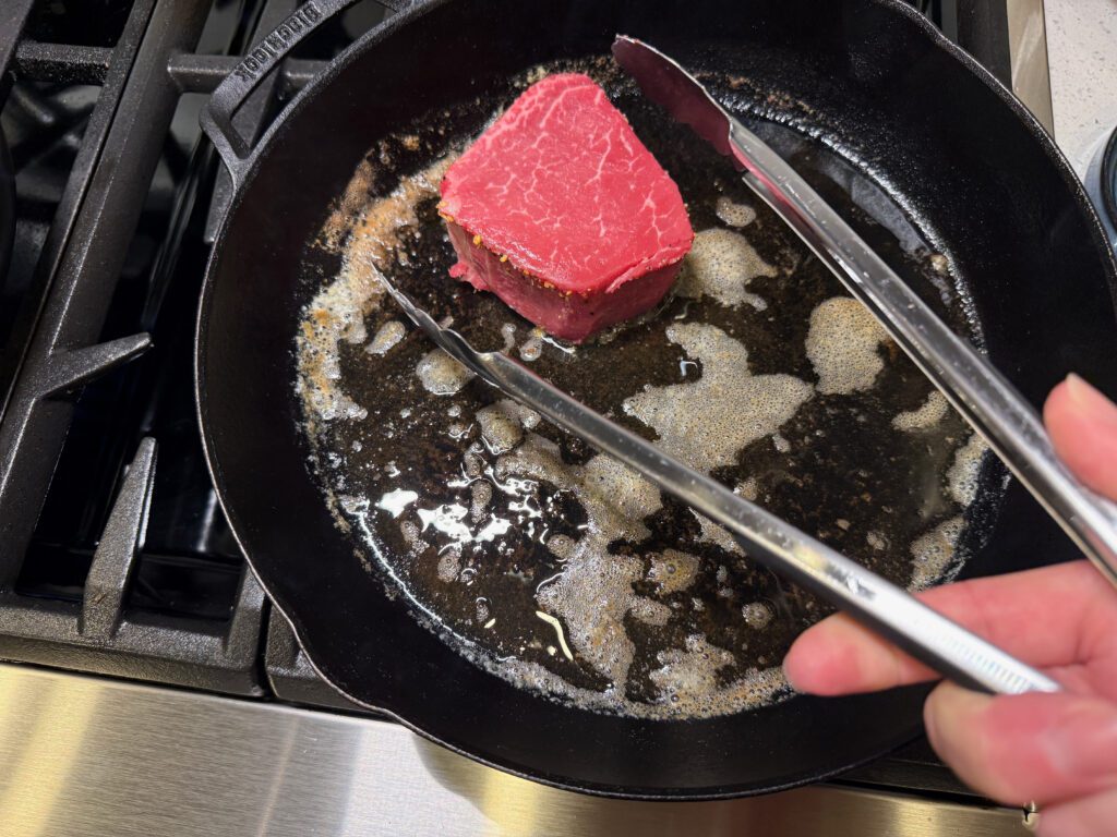 filet mignon in a cast iron skillet